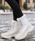 Damen wasserdichte Winterstiefel in Schwarz mit Fellborte und Schnürverschluss