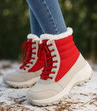 Rote Damen Winterstiefel mit Fellborte, Schnürverschluss und Thermofutter