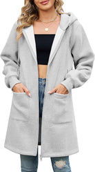 Elvienne Kapuzenjacke in Grün – kombiniert mit Leggings