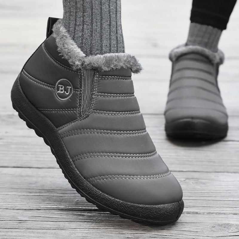 Grüne gefütterte Winterstiefel – wasserdichtes Material Detailansicht